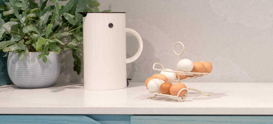 Cream chicken egg skelter holder in a kitchen