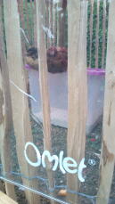A clear cover used to shelter the chickens.