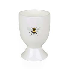 An eggcup with a bee on the front.