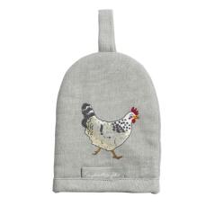 A egg cosy with a chicken on front