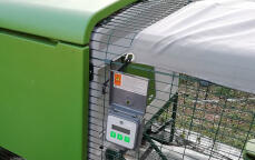 Omlet Automatic Chicken Coop Door Attached to Omlet Eglu Cube Large Chicken Coop and Run