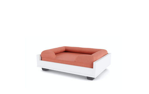 Una cama de espuma de memoria rosa en un sofá de Fido, tamaño 24