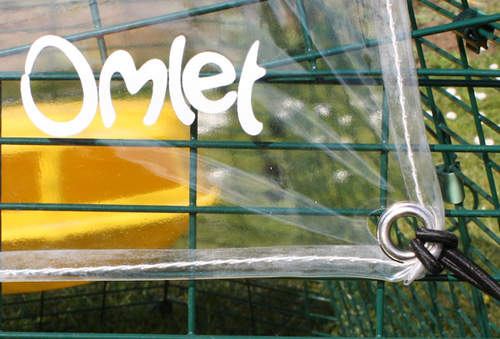 Close up of Omlet clear cover and bungee cords on a Eglu Cube Chicken coop run