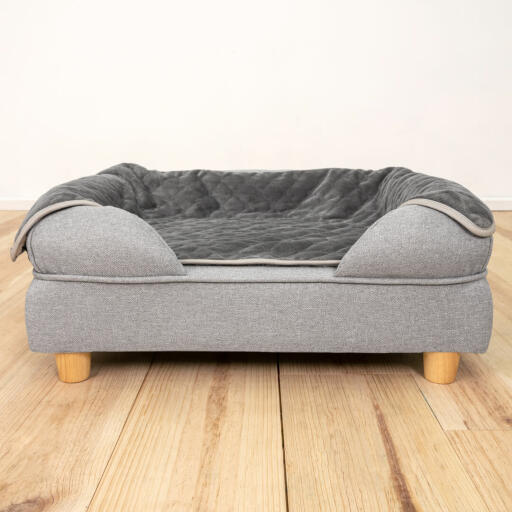 Con este elegante y atemporal diseño querrás que la cama de tu perro sea vea