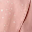 Estampado de flores de cerezo en una tela rosa bebé