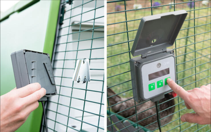 an autodoor control panel being fitted and programmed on the side of an animal run