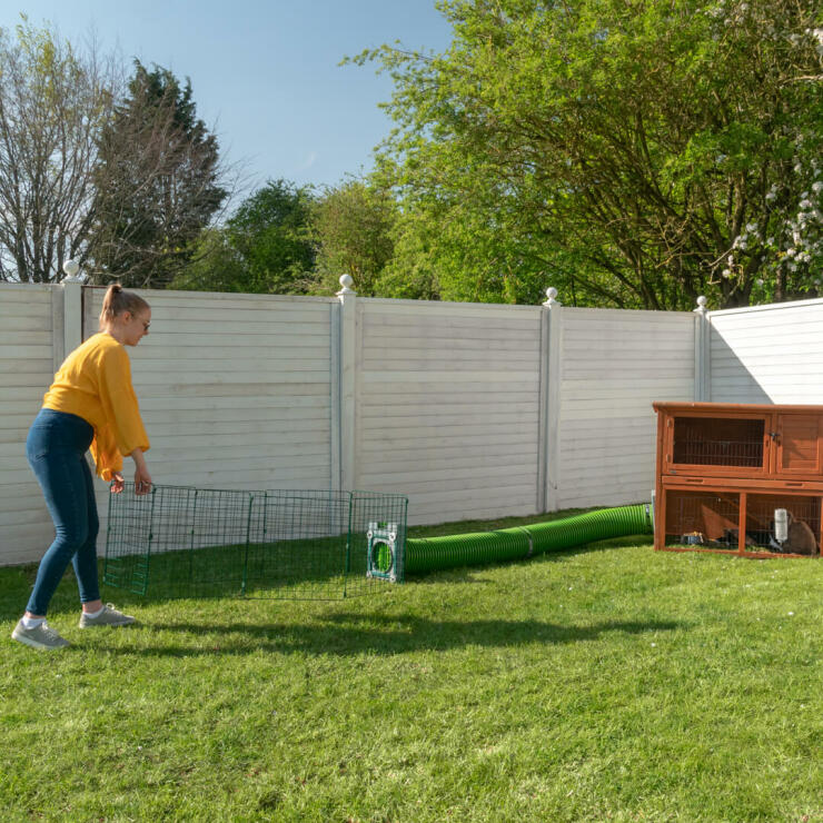It’s quick to move a Zippi rabbit playpen to a fresh spot of grass.