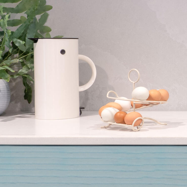 Cream chicken egg skelter holder in a kitchen