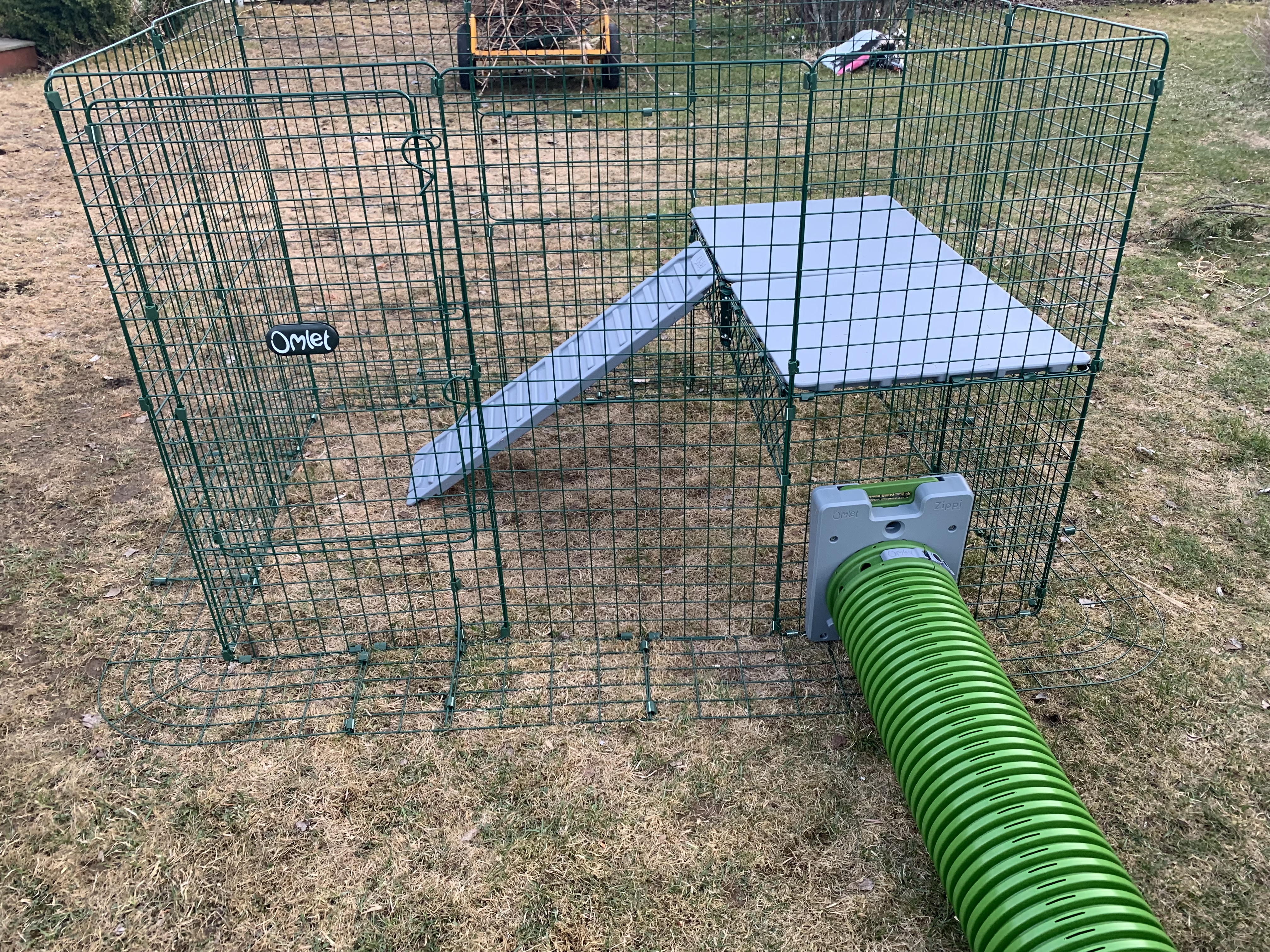 A tunnel connected to an outdoor enclosure